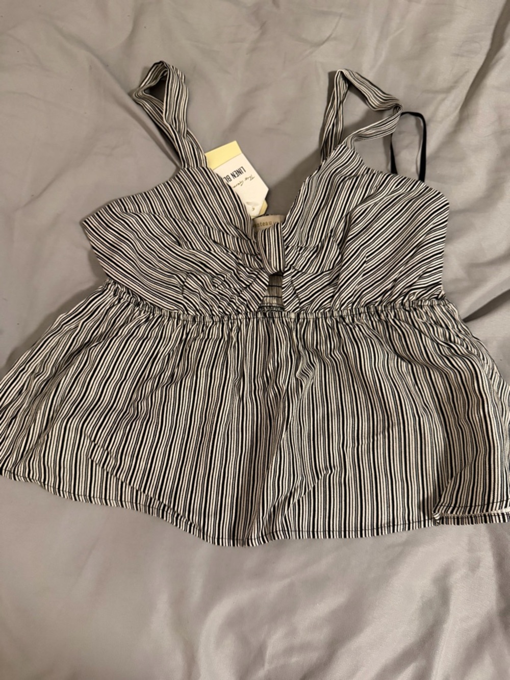 Striped Sleeveless Peplum Top in Black & White